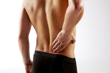 Young man with back pain