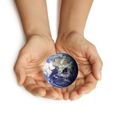 Hand holding the blue Earth