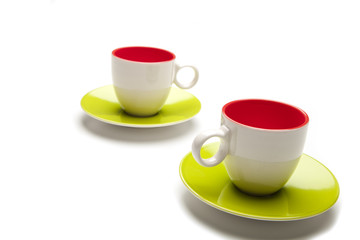 two cup and saucers on white background