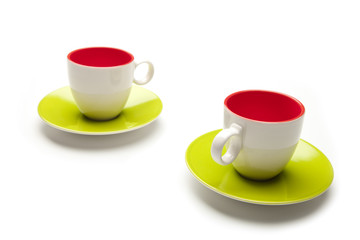 two cup and saucers on white background