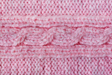 Pink braid, wool knitted background texture