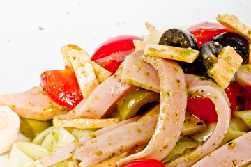 photo of delicious pasta (tagliatele) with bacon and tomatoes