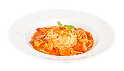 A plate of linguini with sauteed shrimp, tomato, chili  and oliv