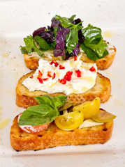 different colored Canapes on a white background