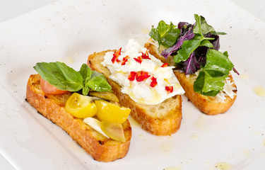 different colored Canapes on a white background