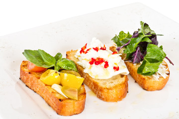 different colored Canapes on a white background