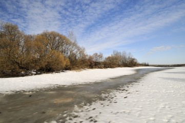 Bottom of the drained lake during a snowy season