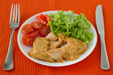 salmon with mustard sauce and salad