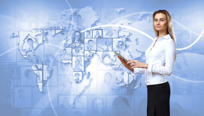 Business person against technology background