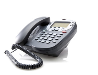 Gray office telephone isolated on a white background