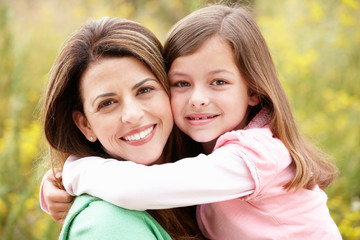 Portrait Hispanic mother and daughter