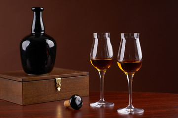 composition with  bottle and glass of brandy