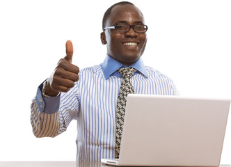 Happy black man with laptop