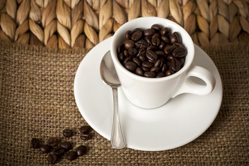 Coffee cup and coffee beans