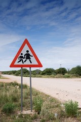 Danger sign: chiildren crossing road, Namibia