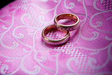 wedding rings on a tie