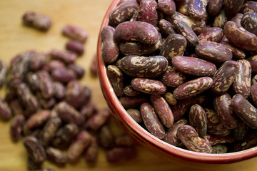beans in a bowl on a wooden table