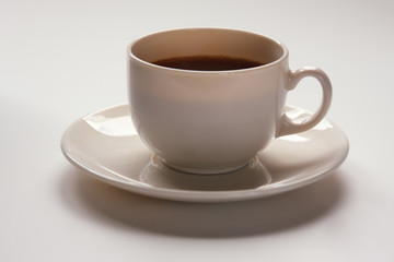 Closeup of a cup of coffee isolated on white