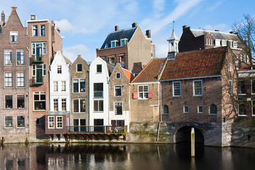 Fototapeta na wymiar Historic cityscape along a channel in Delfshaven, a district of