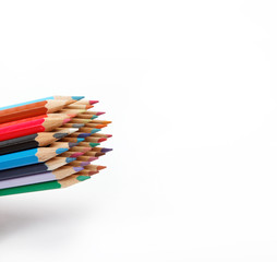 Colored pencils on a white background.