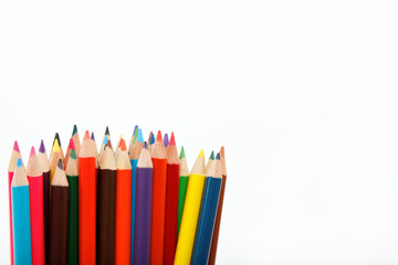 Colored pencils on a white background.