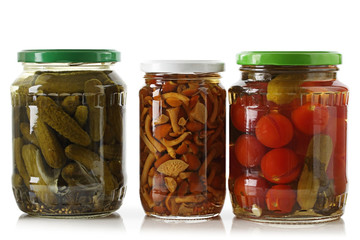 Pickled cucumbers, tomatoes and mushrooms.