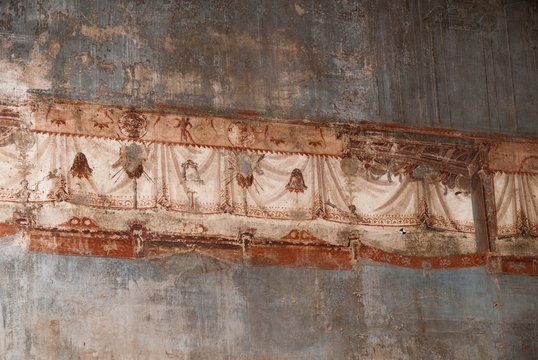 Damaged Fresco in the buried Roman city of Herculaneum Italy