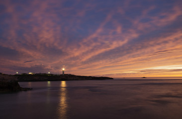 Naklejka premium Sunset with lighthouse