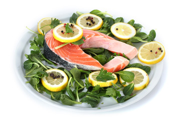 Red fish with lemon, parsley and pepper