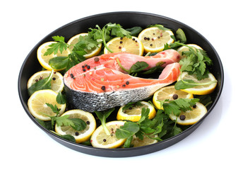 Red fish with lemon, parsley and pepper