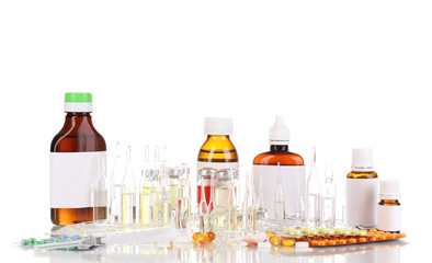 Medical bottles with syringe, medical ampoules and tablets