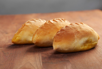 pierogi .Home cake with jam against
