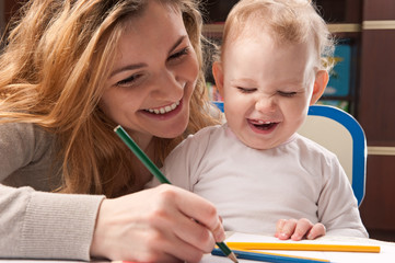 Mother and daughter drawing