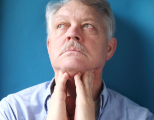 businessman feeling painful lymph glands