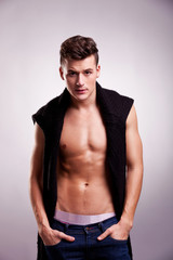 Fototapeta premium Handsome athletic young man posing