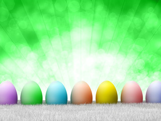 Happy Easter - colored eggs on green background