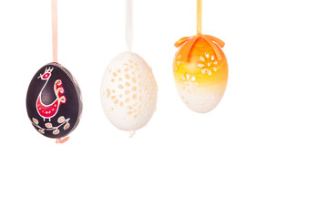 Easter egg with festive bow isolated on white background