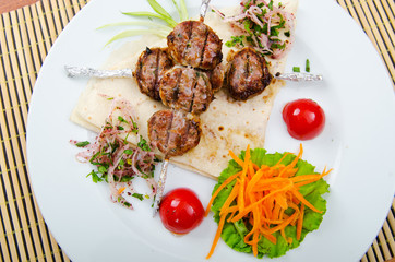 Meat cuisine - kebab served in plate