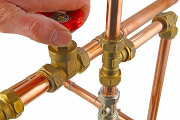 hand on gate valve on  pipework