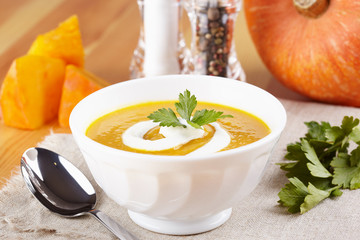 Pumpkin soup on the served table