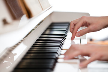 Fototapeta premium Playing Piano (shallow DOF; color toned image)