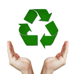 recycled paper sign floating on well shaped hand