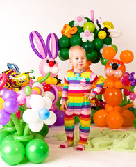 Obraz na płótnie Canvas Cute baby in balloon forest
