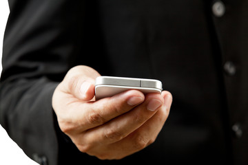 Businessman holding mobile phone