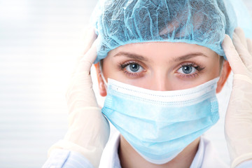 female doctor in medical gloves