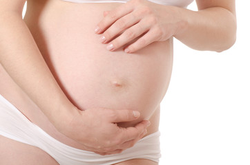 Fototapeta na wymiar Pregnant woman with beautiful belly