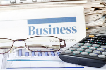 Business the newspaper with chart