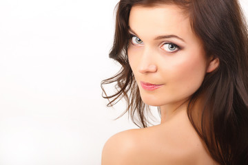 Fototapeta premium Portrait of young beautiful model over white background