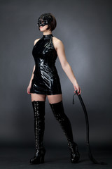 Девушка с плёткой