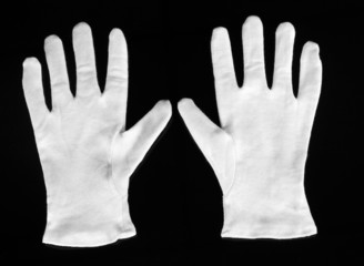 cloth gloves on black background.